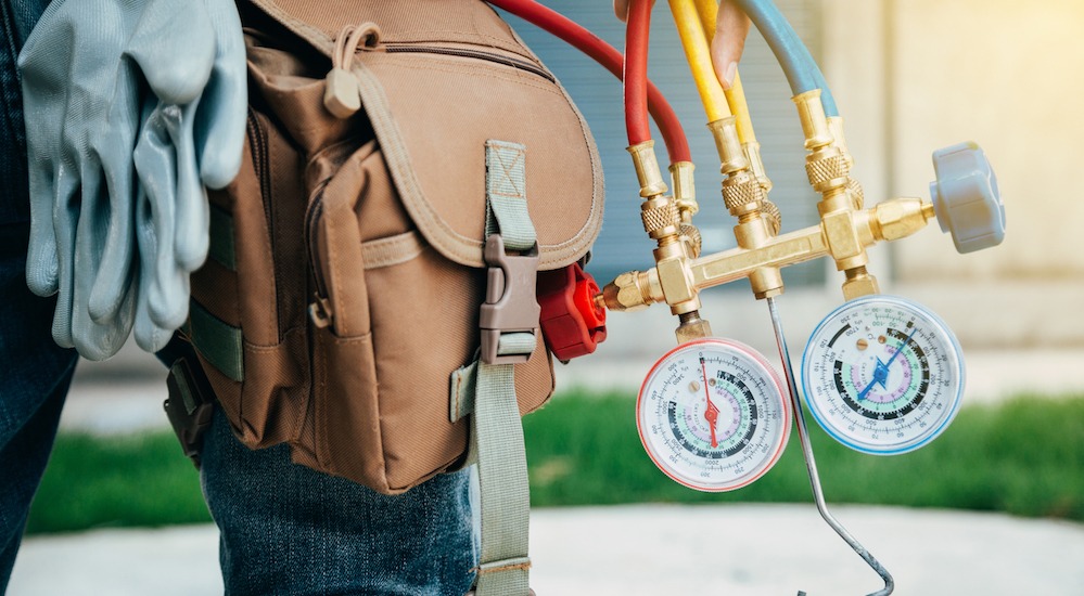 A person with a backpack and some gauges