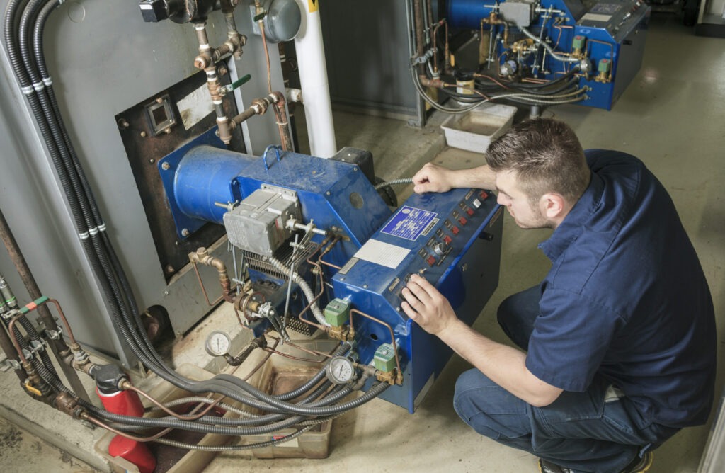 A man working on an electric motor.